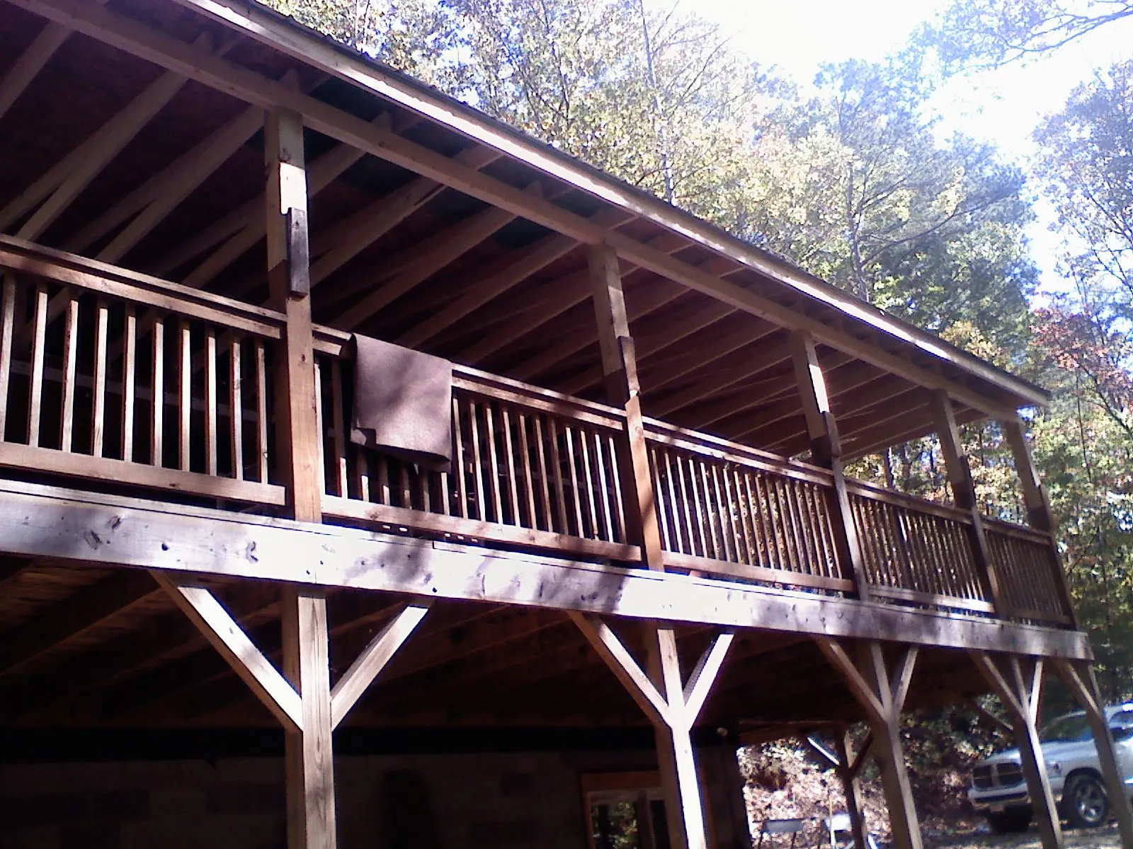 Timber framing under a new elevated porch and deck — Roof Leak Repair in Superior by Roofing Brothers